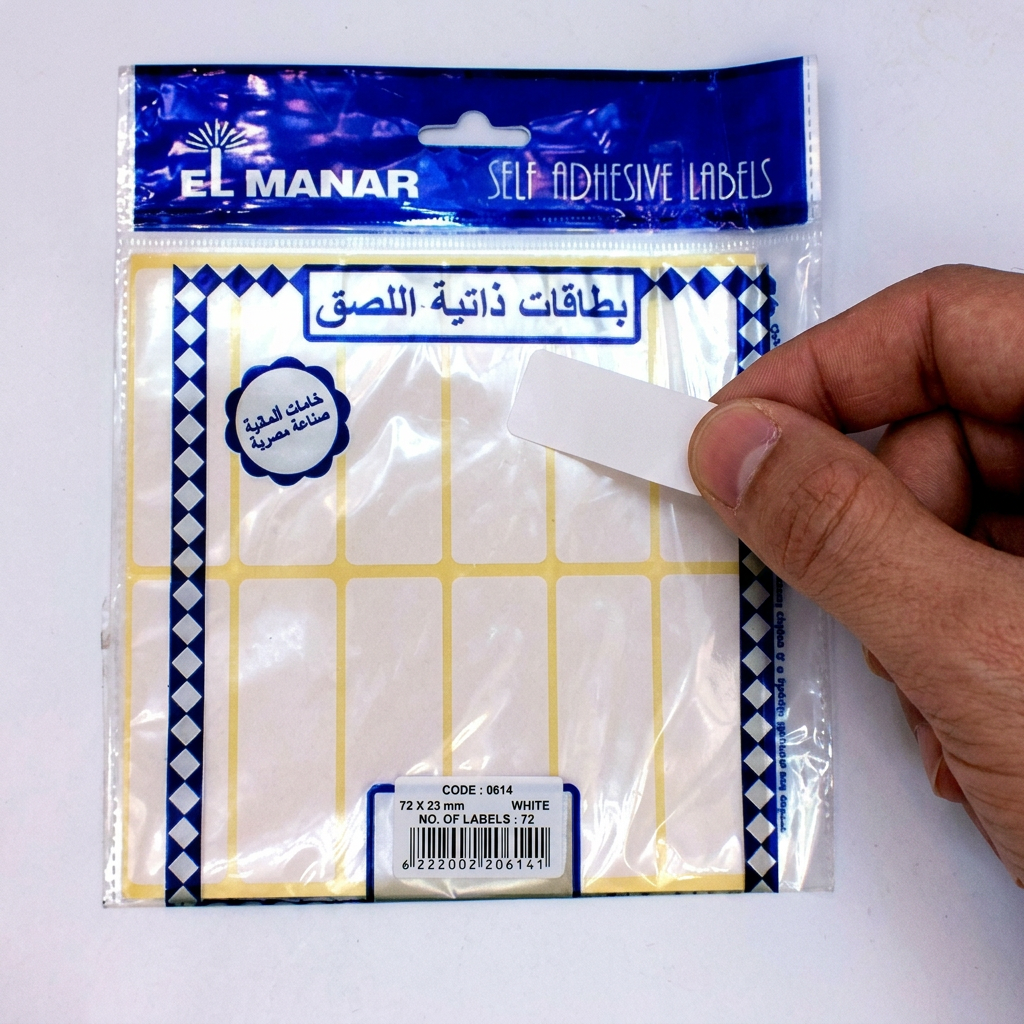 Labeling a file folder with a white El Manar self-adhesive label
