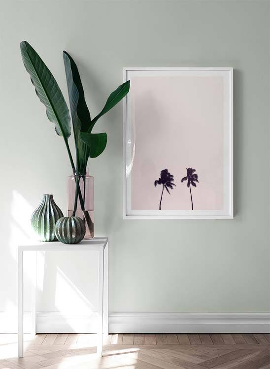 إطار من أشجار النخيل بلون السماء الوردية 