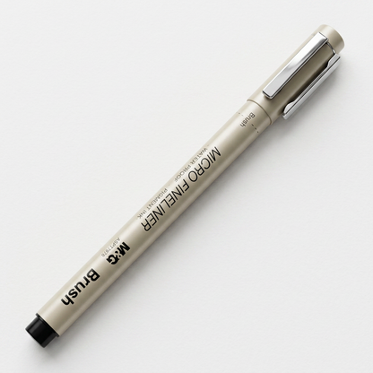 M&G micro fineliner brush pen flatlay with brush-lettering sample