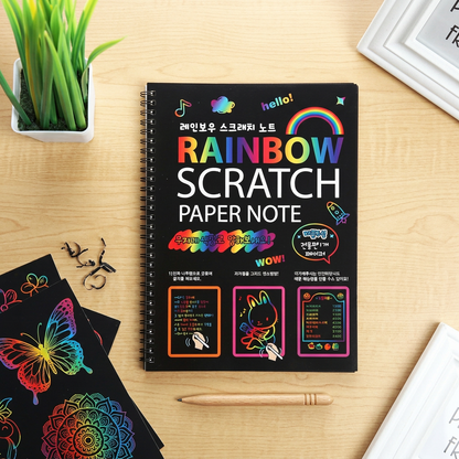 Magic colorful scratch-art drawing book with stylus flatlay