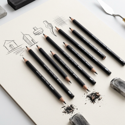 M&G hard sketch charcoal pencils flatlay with charcoal sketch