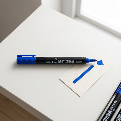 M&G oil-based paint marker flatlay with marked sample