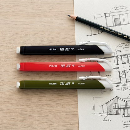 Milan Tri-Jet eraser pen flatlay with pencil and sketch