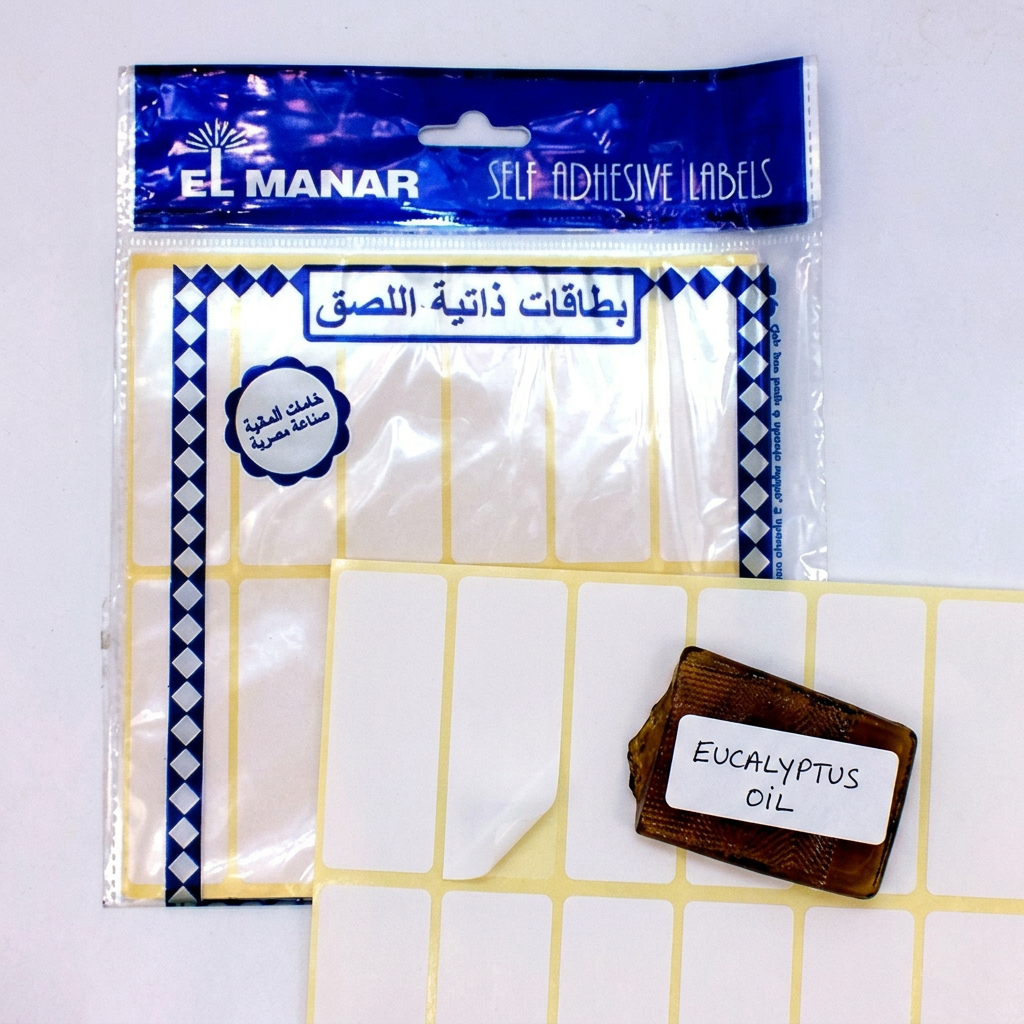 El Manar white labels pack flatlay with handwritten folder label