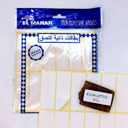 El Manar white labels pack flatlay with handwritten folder label