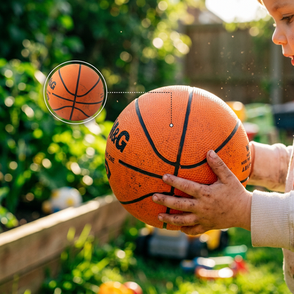 Child playing with the M&G small rubber handball