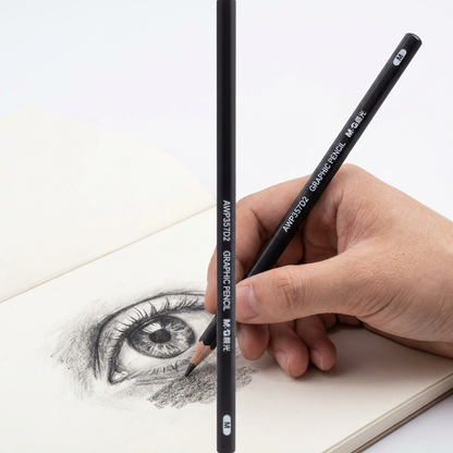 Hand shading a sketch with the M&G medium sketch charcoal pencil