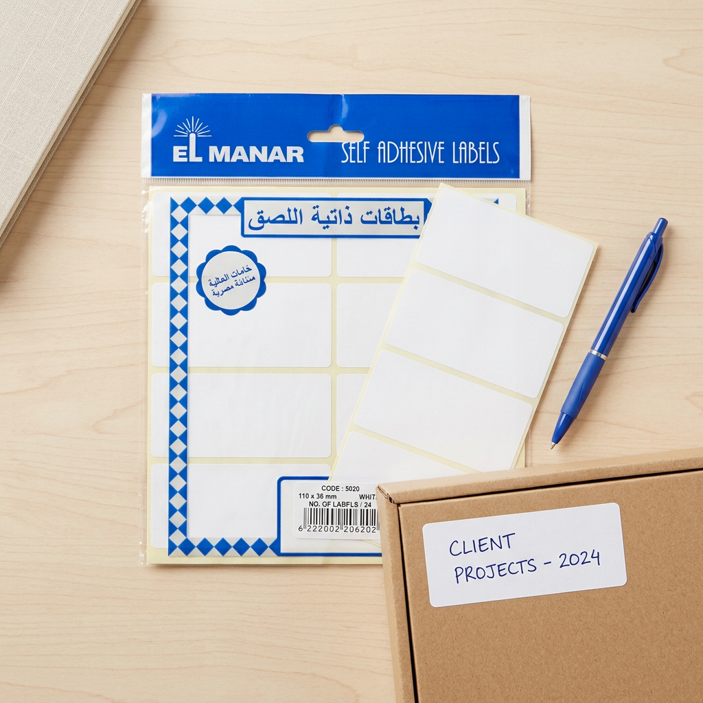 El Manar 110x38mm labels pack flatlay with labeled file box and pen
