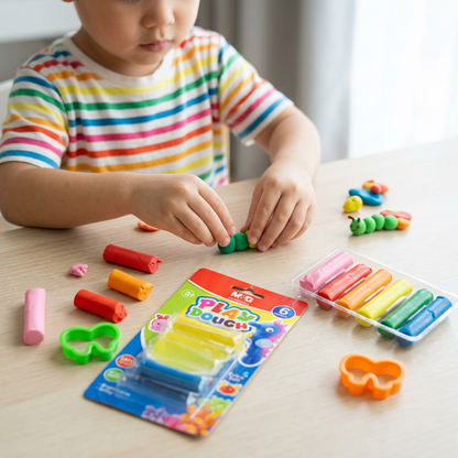Child molding figures with the M&G play-dough plasticine set
