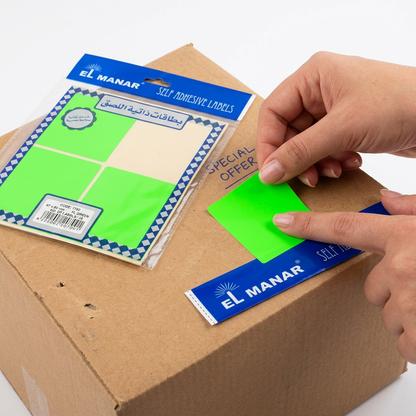 Marking a special offer box with El Manar fluorescent green 67x80mm label