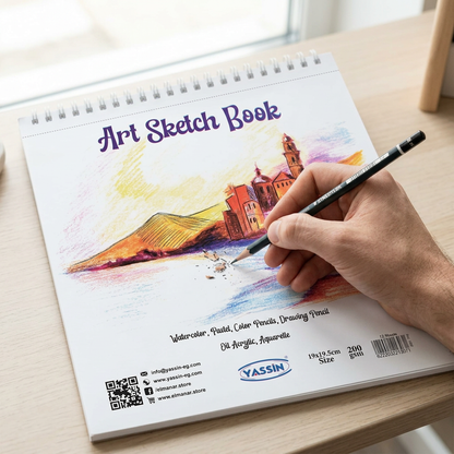 Hand sketching in the open Yassin small white wire-bound sketchbook