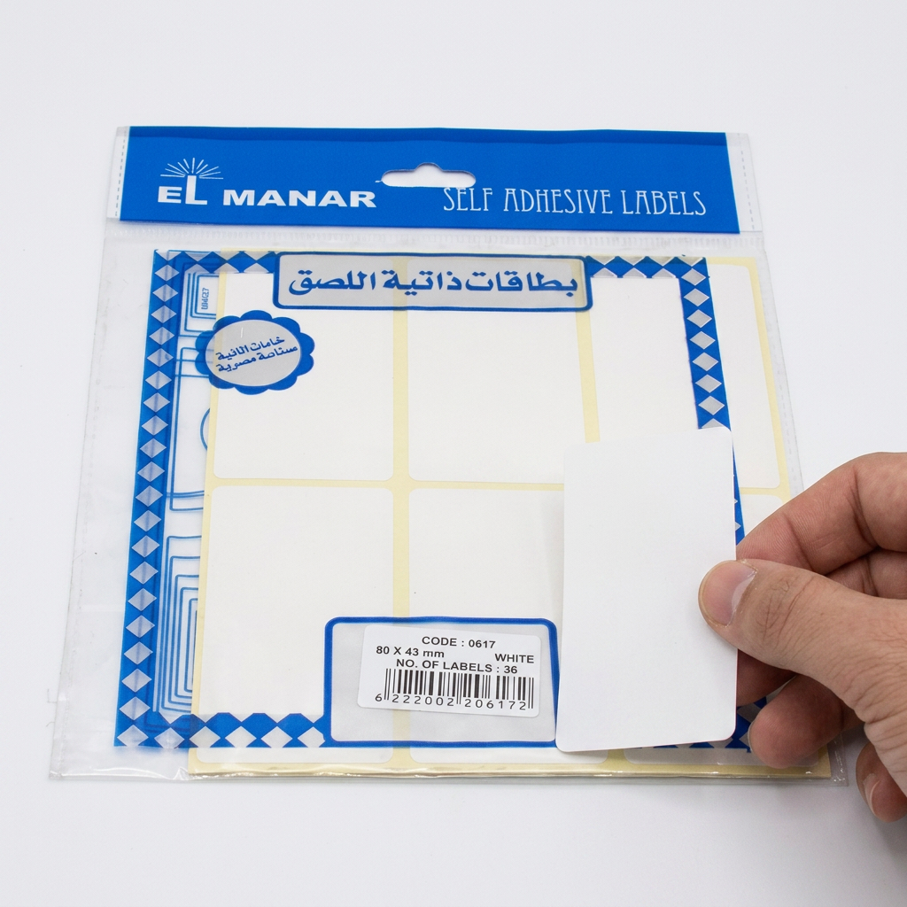 Labeling a storage box with a large white blank El Manar self-adhesive label