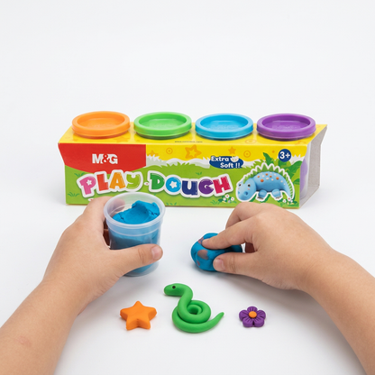 Child molding colorful shapes with the M&G play-dough 4-color set
