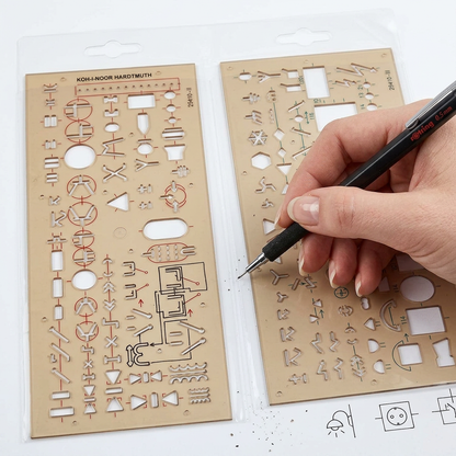 Koh-I-Noor electrical-installation template stencil in use on a technical drawing