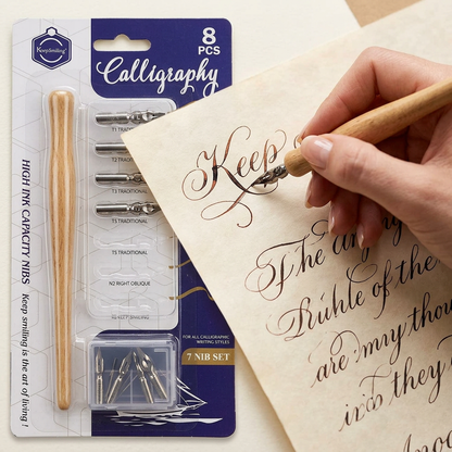 Hand using a Keep Smiling calligraphy dip pen to write elegant script