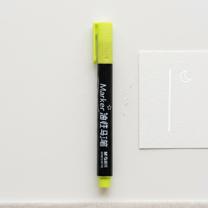M&G oil-based paint marker flatlay with marked sample
